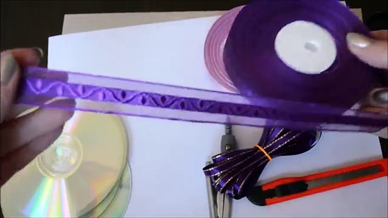 Подхваты для штор из CD-дисков. Tiebacks from the CD-ROM drive.