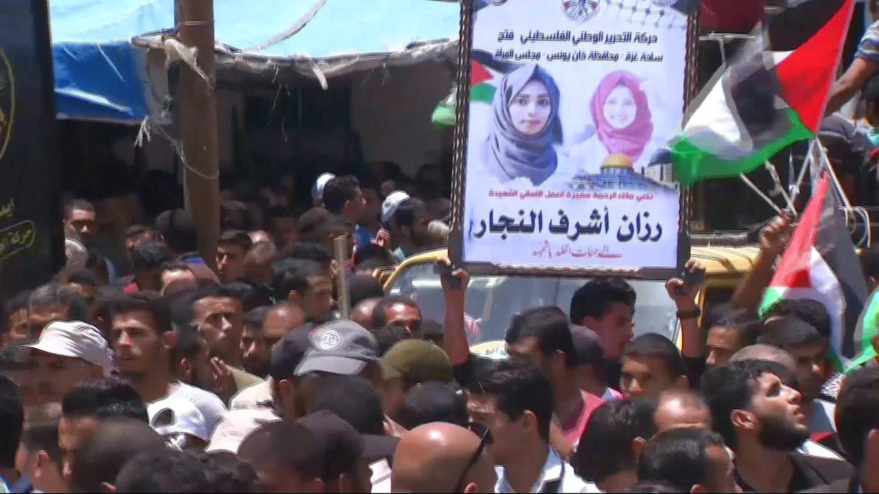 Razan al-Najjar 'angel of mercy': Thousands attend funeral for Gaza medic