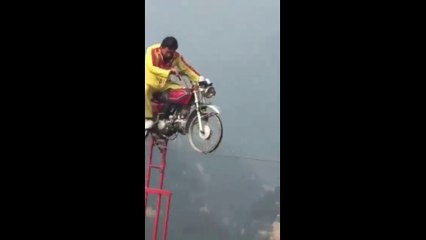 Amazing Riding Motorcycle on Rope