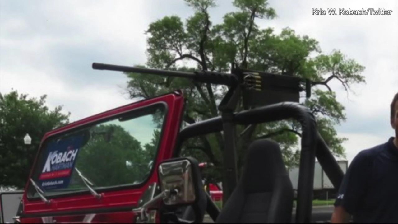 Kansas Governor Candidate Faces Backlash For Machine Gun Replica in Parade