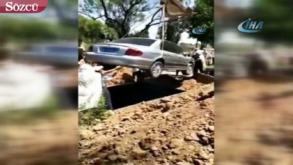 Çin’de bir adam otomobiliyle birlikte gömüldü