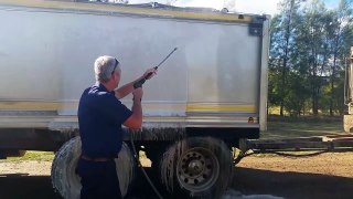 Touchlessly cleaning a couple of dirty trailers