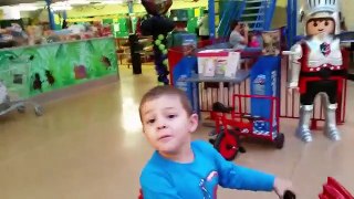 New indoor playground. Kids playing with motorcycle , blocks, wheel fun, and more toys.