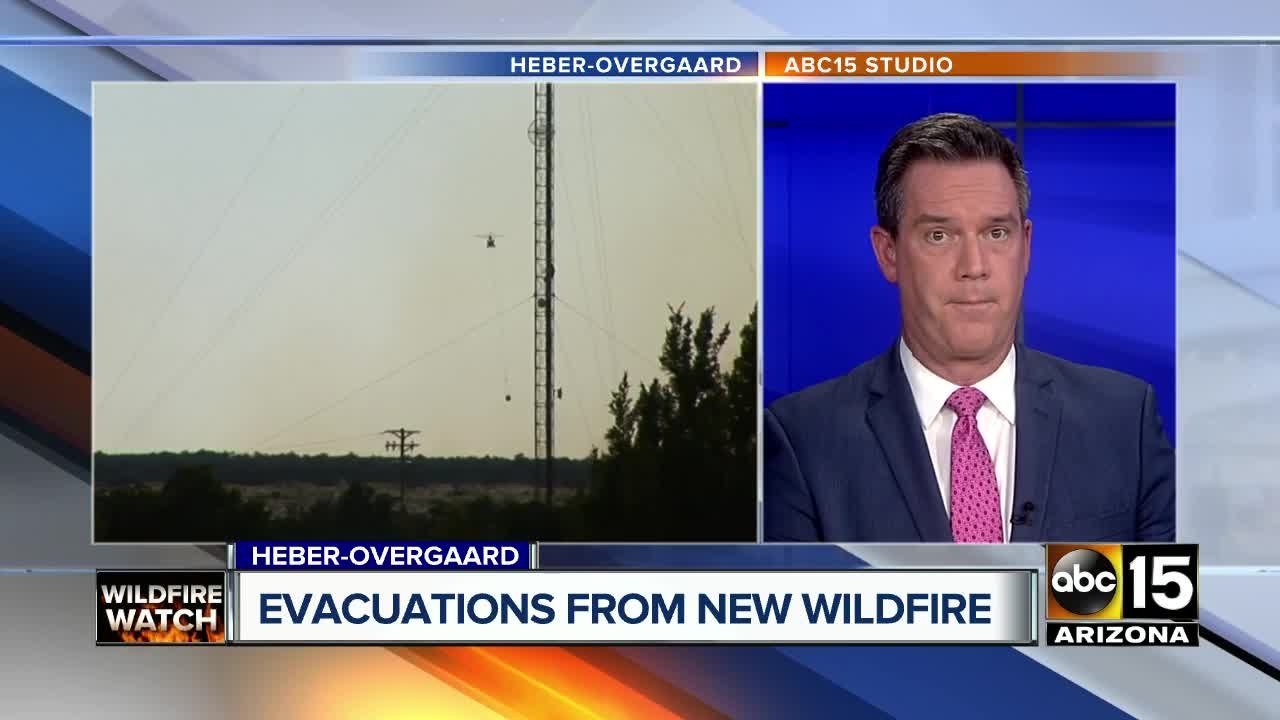 377 wildfire threatening structures as fire crews battle for containment