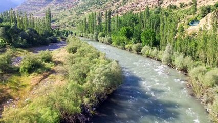 Kato Dağı eteklerinde pet şişeli ve terlikli rafting havadan görüntülendi