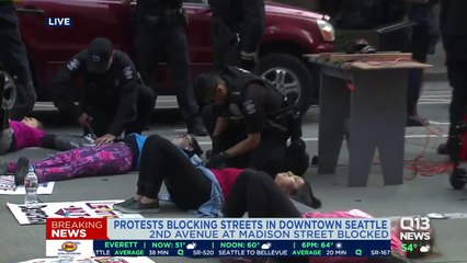 Protesters Calling for Abolition of ICE Block Downtown Seattle Street