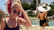Bride-to-be Anna Heinrich poses by the pool in Italy in skimpy black swimsuit while her fiancé Tim Robards tries on tuxedos with his best men as the Bachelor couple gear up for their wedding