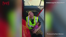 Photo of Firefighter Cradling Baby After Car Accident Goes Viral