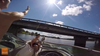 Epic Beer Toss Over Active Bridge From Speed Boat
