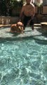 Slow motion captures dog learning to swim