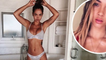 Makeup-free Big Brother star and fashion designer Aisha Jade strips down to grey bra and briefs to flaunt eye-catching cleavage and taut physique