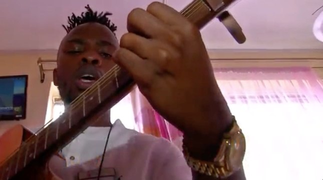 Kenyan Guitar Player Uses Music to Sooth Hospital Patients
