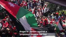 Jordanians protest in capital Amman amid strike over tax bill