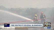 Fire destroys several businesses at Phoenix strip mall threatened homes
