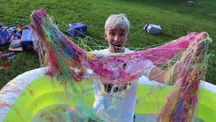 10,000 CANS OF SILLY STRING VS POOL!!