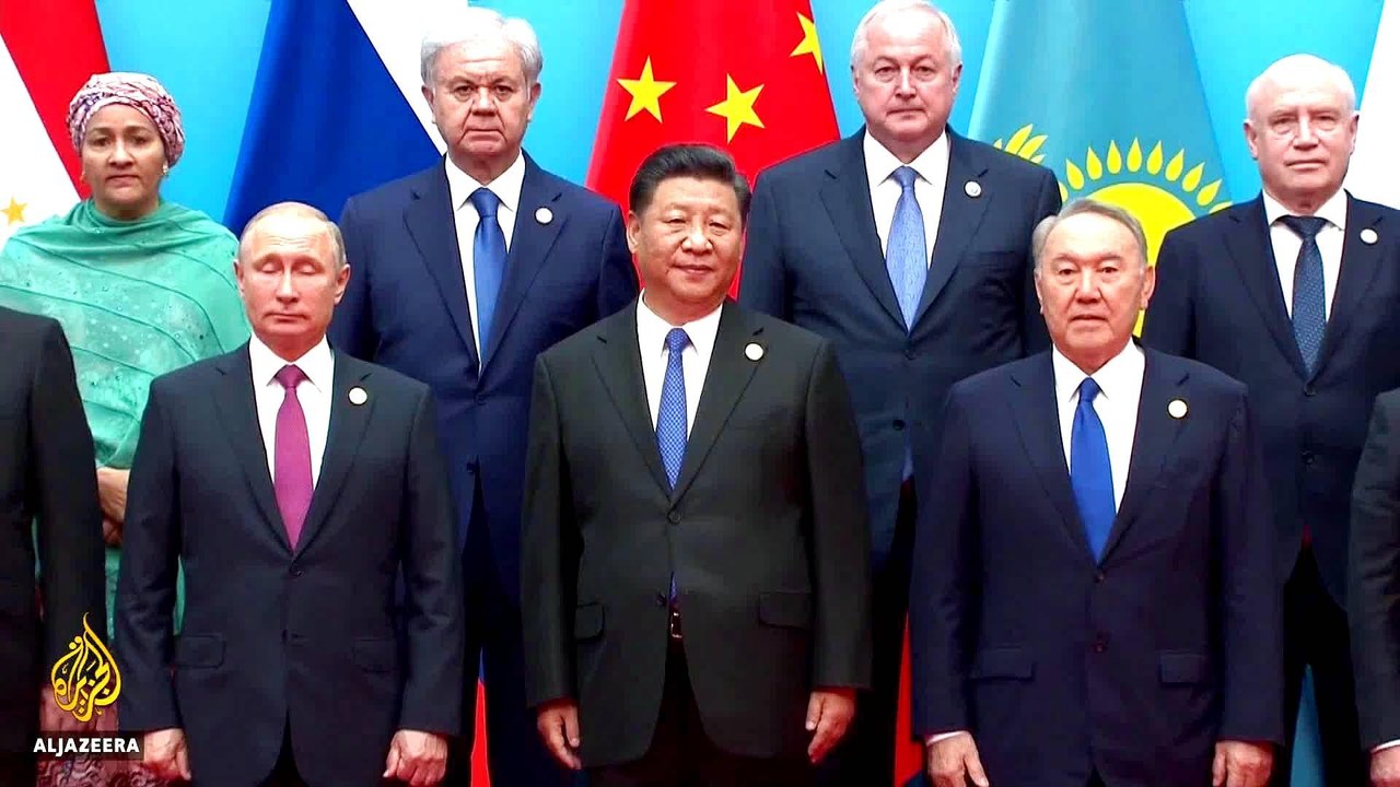 Iran, Russia vow to uphold nuclear deal at China summit