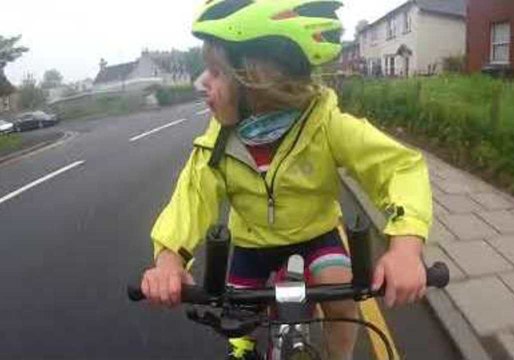 Child Cyclist Gives Thumbs-Up to Courteous Truck Driver
