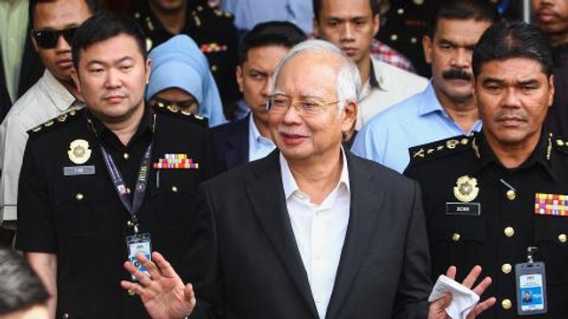 Cops seize several boxes from Najib’s alleged ‘safe house’