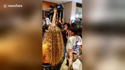 CORRECT VERSION: Kim Jong Un imposter poses with "fans" day before Kim-Trump summit