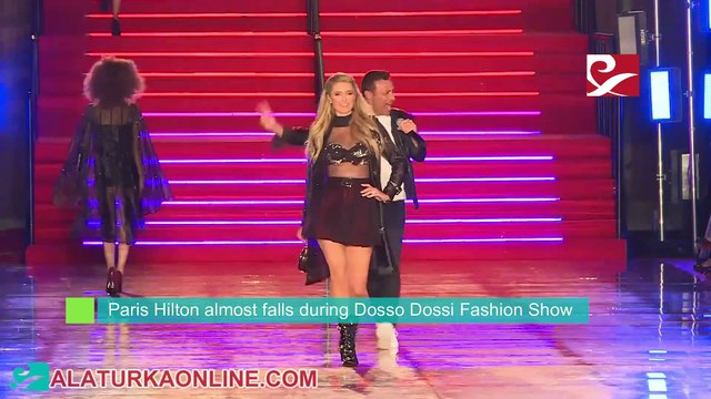 Paris Hilton almost falls during Dosso Dossi Fashion Show