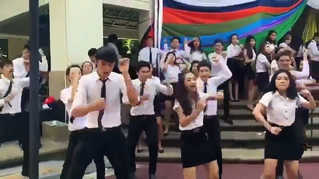 Handsome men and beautiful girl thai students dance
