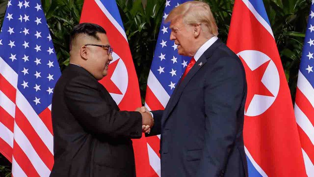US President Donald Trump and North Korean leader Kim Jong Un meet for historic meeting