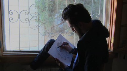 رسام الثورة السورية يحلم برسم لوحة النصر