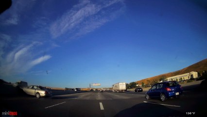 Distracted Driver Meets Highway Divider