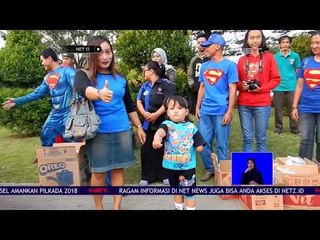 Puluhan Orang Berkostum Superman Bagi Bagi Takjil Kepada Pemudik - NET 12
