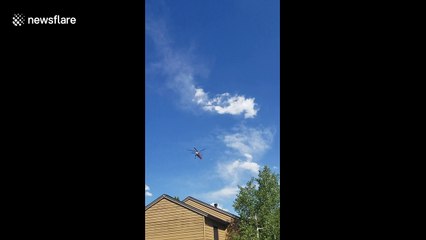 Firefighting helicopter en route to Buffalo Fire in Colorado county