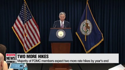 Fed hikes rates, points to 2 more increases by end of 2018