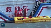 Getting ready for tough calls! Chinese rescuers hold a large-scale search and rescue drill in waters off Shanghai.