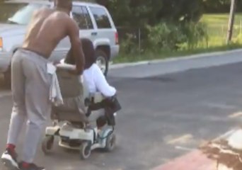 Kind Stranger Pushes Woman Home After Her Electric Wheelchair Runs Out of Power