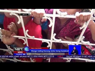 Warga Saling Dorong Antre Uang Sedekah -NET12