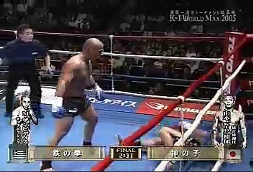 Απολαύστε τη μοναδική νίκη του Πρωταθλητή μας Μιχάλη Ζαμπίδη, με το συγκλονιστικό νοκ αουτ στο τρίτο γύρο, απέναντι στον Ιάπωνα θρύλο ΜΜΑrer και kick boxer, τον