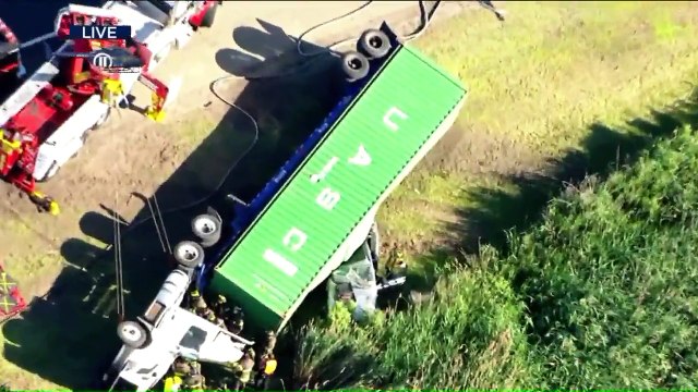 Overturned Truck Lands on Car on New Jersey Turnpike