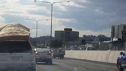 Car Drives With Mattress Loosely Secured