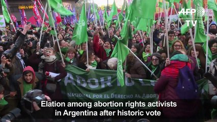 Women in favor of abortion bill celebrate historic vote