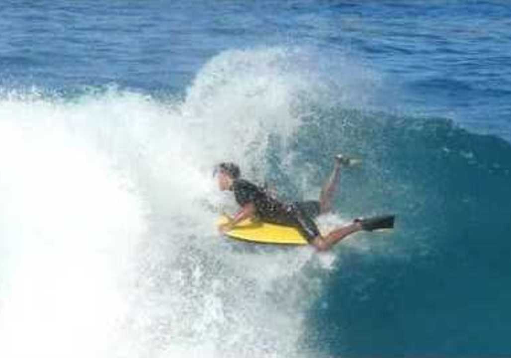 Keen Surfers Hit the Magical Waves of Laʻaloa Bay, Hawaii