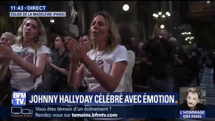 Debout, les fans de Johnny l'applaudissement à la Madeleine