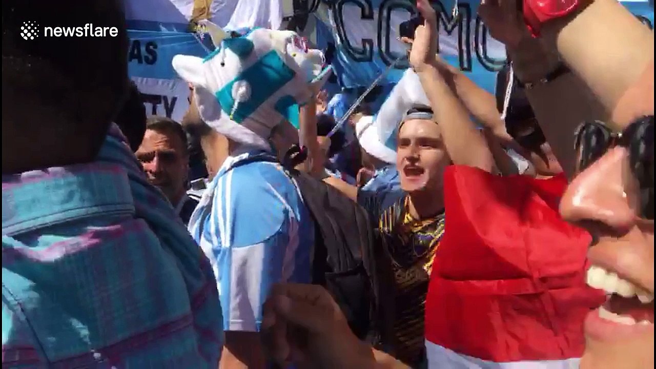 Fired-up Argentina fans jump and dance in Moscow