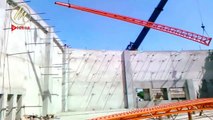 Lifting up the Main Truss with supporting of 2 Cranes - Mega Videos