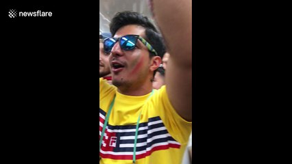 Elaborately dressed Iranian fan heads to team’s first match