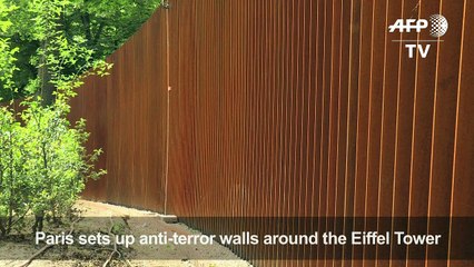 Paris puts final touches to Eiffel Tower anti-terror walls
