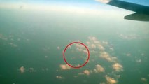 Plane passenger captures glowing UFO | Bizarre midair UFO sighting freaks out plane passengers