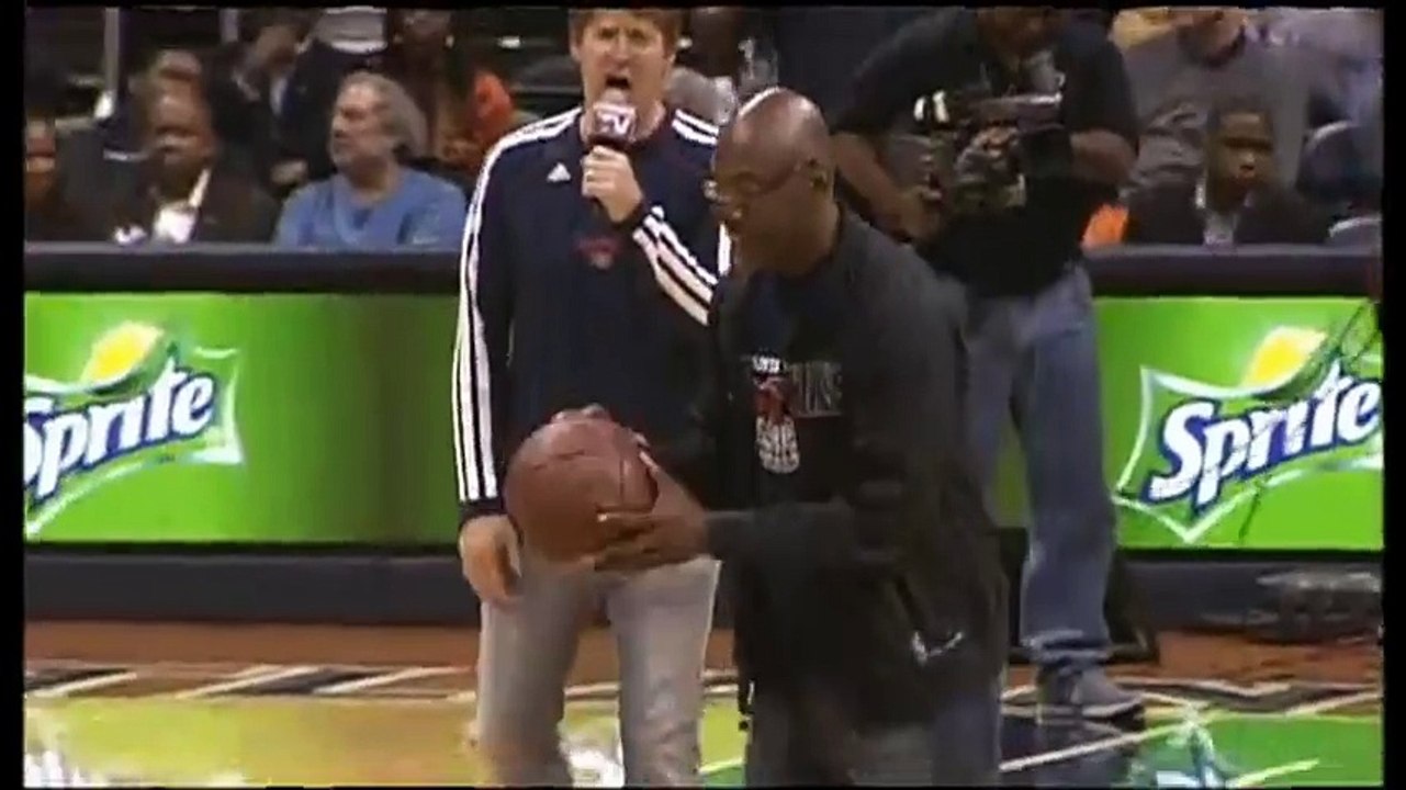 Hawks fan throws 'Miracle Shot' from half court!