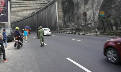 Meski Berbahaya, Pemudik Nekat Berfoto di Terowongan Nagrek