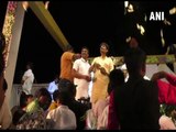 Gujarat Congress leader Alpesh Thakur showers money at a devotional programme in Patan
