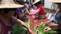 Villagers make 20-metre-long rice dumpling for Dragon Boat Festival