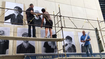Dijon : des visages apparaissent sur la façade de la librairie Grangier